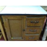 A vintage pine kitchen cupboard base with white enamel top