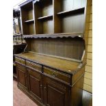 An oak Priory-style dresser