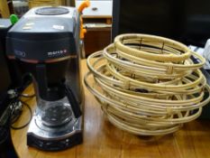 Marco 'Pouring Perfection' coffee machine and a modern basket style lamp E/T