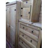 Mexican pine style bedroom suite of double wardrobe, four drawer chest and bedside cabinet