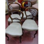 Four matching upholstered antique style balloon back chairs