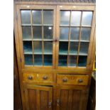 Vintage bookcase cupboard with twin glazed upper doors, central twin drawers and two base cupboards