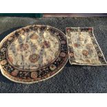 Large circular floral rug 180cms diam.and one other smaller rectangular rug 130 x 77cms