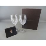 Boxed pair of Waterford crystal wine glasses