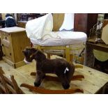Baby's Moses basket and stand and a small rocking horse