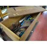 Wooden chest with contents of vintage hand tools, chisels and bellows E/T