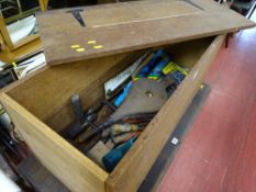 Wooden chest with contents of vintage hand tools, chisels and bellows E/T