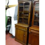 Antique bookcase cupboard with single upper glazed door, central drawer and single base cupboard