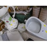 A slipper chamber pot and china part wash set