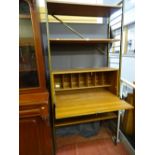 Ladderax style shelving unit with central interior bureau section