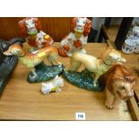 Pair of Staffs dogs with baskets, pair of greyhounds and a Staffs lion etc