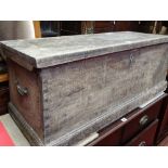 Wooden tool chest with metal handles either end