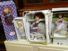 Two Das Puppen boxed porcelain headed dolls and two similar others