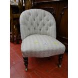 Button back classically upholstered nursing chair