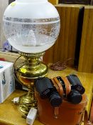 Trentor binoculars in case and a brass lamp E/T