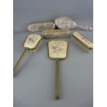 Vintage dressing table mirror and brush set and three hallmarked silver brushes