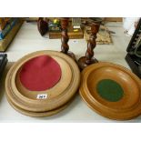 Quantity of treen altar dishes and a pair of twist candlesticks
