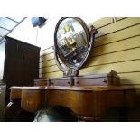 Victorian mahogany Duchess dressing table having an oval mirror