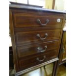 Four drawer bedside cabinet with inlaid detail and tapered supports