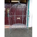 Metal garden pagoda style arch with seat