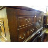 Antique pine lidded chest on stile supports containing quantity of curtains etc