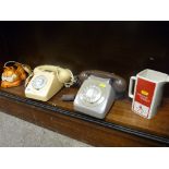 Two vintage telephones, a Garfield Cat telephone and a Wade Johnnie Walker whisky water jug