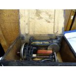 Cased vintage Wellington manual sewing machine
