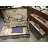Three leather suitcases and a good Finnegan's travelling case (no containers)