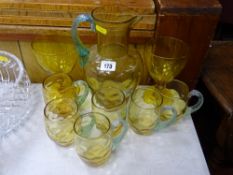 Amber glass lemonade set with green swirled handles etc