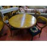 Circular mahogany pedestal dining table and four balloon back dining chairs with tapestry seats