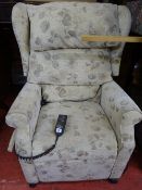 Electric recliner chair with floral upholstery by A J Way & Co Ltd E/T