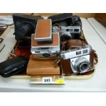 Vintage SLR cameras to include a Kodak Retinette, two Zorki-4, Zorki-4K, Canon Canonette, Polaroid