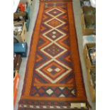 Suzni Kelim carpet runner, autumnal tones with repeating diamond central block with triple border,