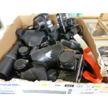 Box of many vintage cameras including Zenit-E, Petri 7S, Pentax and many others