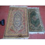 Two small rugs, the larger 150 x 90 cms, the smaller 120 x 60 cms