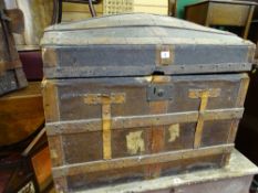 Wooden banded dome topped travel trunk