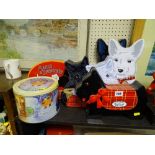 Parcel of four shortbread tins in the form of dogs and two others