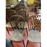 Parcel of wheelback dining chairs including two carvers