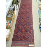 Meshwani carpet runner, red and blue ground with repeating diamond central pattern and single