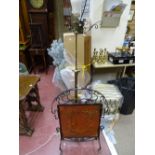 Wrought iron and copper Arts & Crafts style firescreen and a brass standard lamp A/F