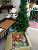 Artificial Christmas tree, well dressed small Father Christmas and other Christmas decorations