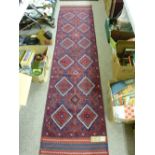 Meshwani carpet runner, blue and red ground multi-diamond pattern with triple bordered ends, 262 x