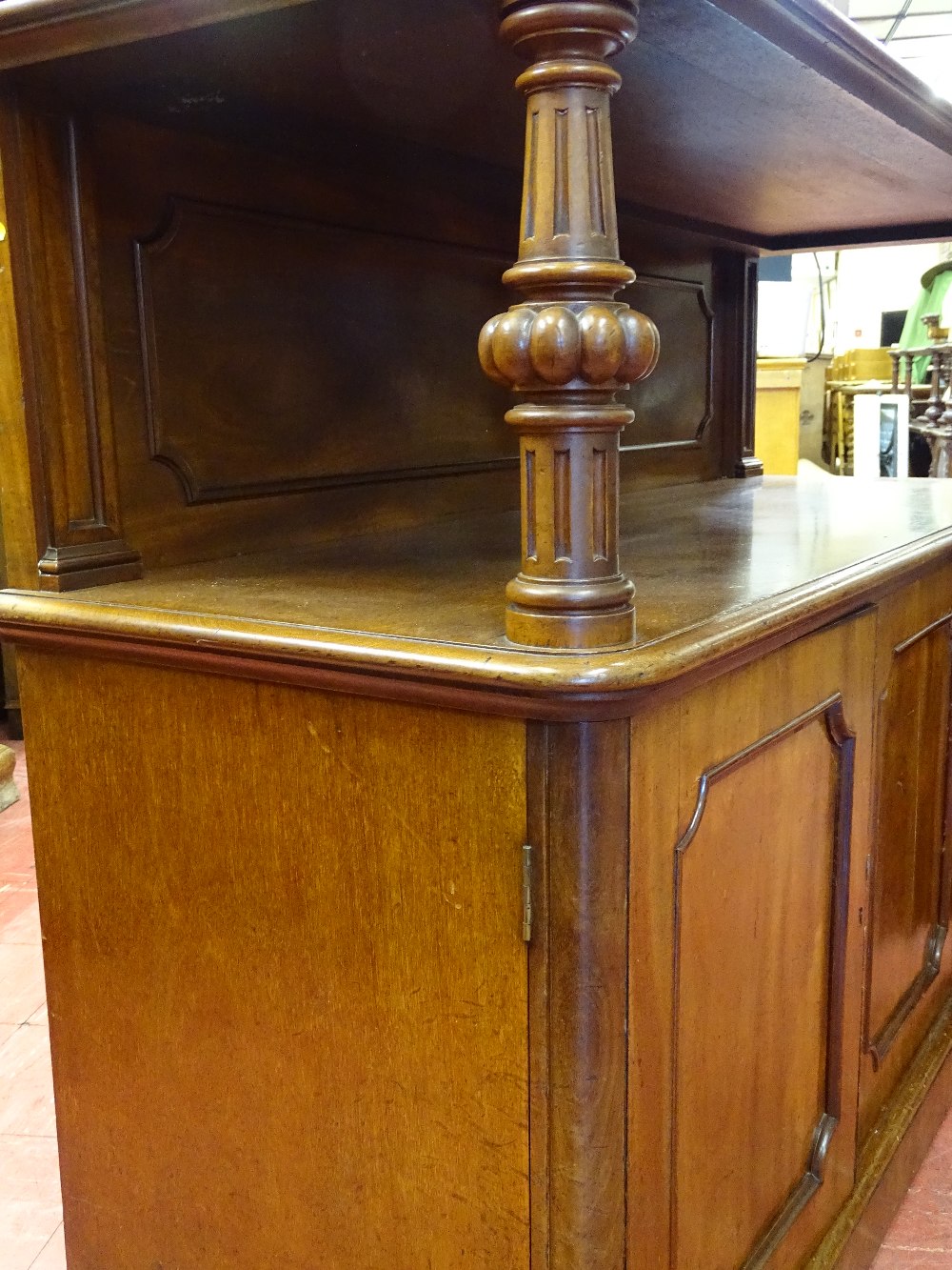 A VICTORIAN MAHOGANY SERVER with shield back rail, carved column supports and triple door lower - Image 4 of 4