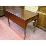 A REGENCY MAHOGANY TWIN FLAP PEMBROKE TABLE with single end drawer, on turned and fluted supports