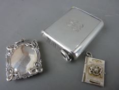 AN ASPREY SILVER VESTA CASE, 1880, a 925 stampholder with pendant loop and a silver charm in the
