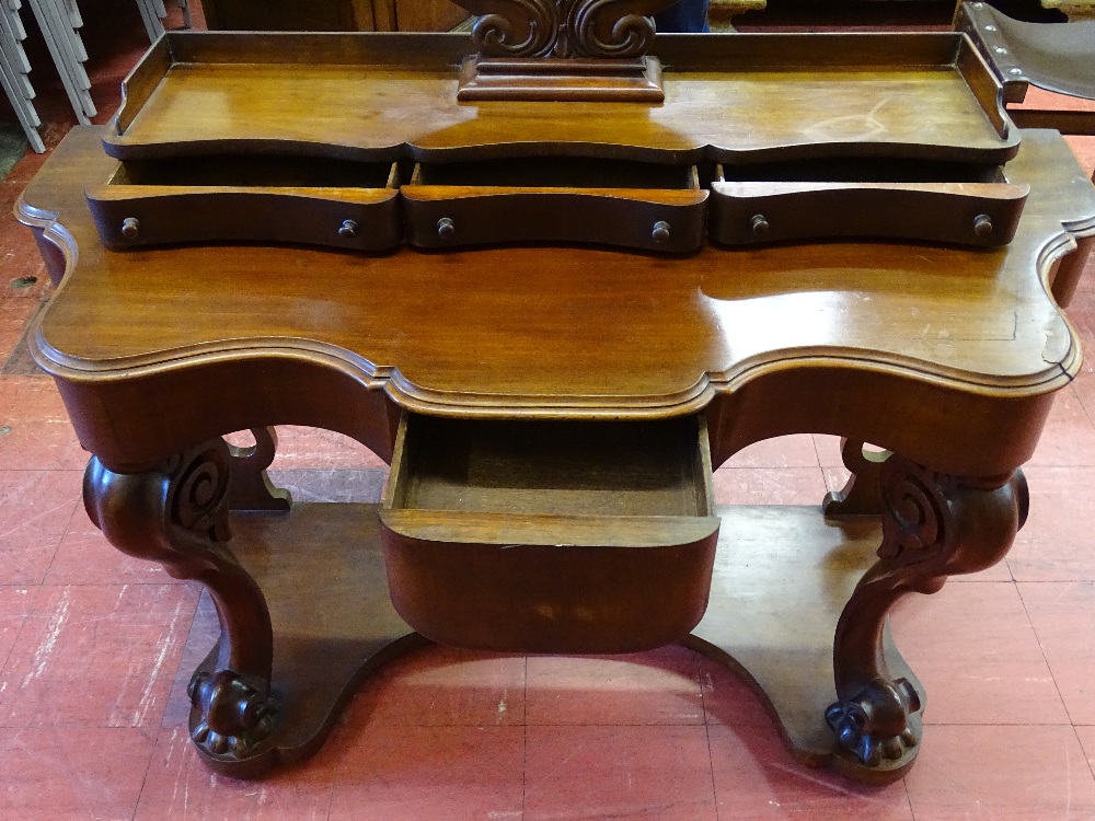 A VICTORIAN MAHOGANY DUCHESS DRESSING TABLE having an oval mirror on carved support above a bank - Image 2 of 3