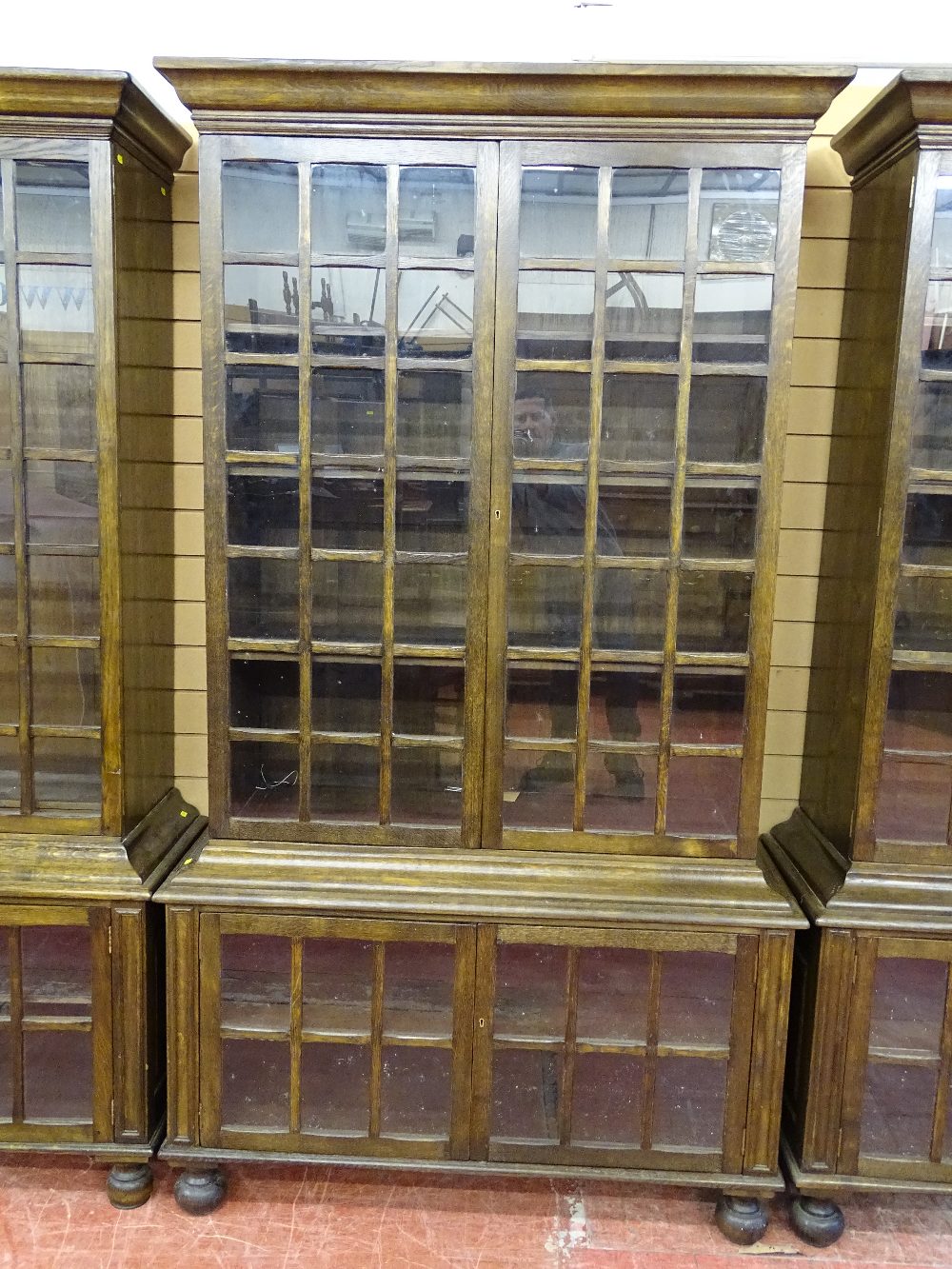 A GOOD SET OF FOUR 20th CENTURY OAK DOUBLE BOOKCASES having multi-panelled twin upper and lower - Image 3 of 6