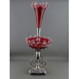 AN EPBM & CRANBERRY GLASS TABLE EPERGNE with griffin and scroll mounts, 65 cms high overall