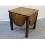 A VINTAGE OAK BOX SEAT STOOL with shaped apron, 47.5 cms high, 47.25 cms wide, 41 cms deep