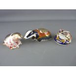 THREE ROYAL CROWN DERBY PAPERWEIGHTS, 'Moonlight Badger', gold stopper, 'Beaver', silver stopper and